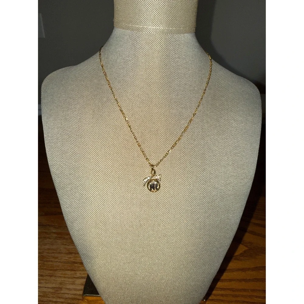 Nina Ricci Gold Tone NR Logo Bow Rhinestone Figaro Chain Necklace Vintage Style